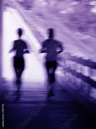 artistic blue and purple blur of a running couple