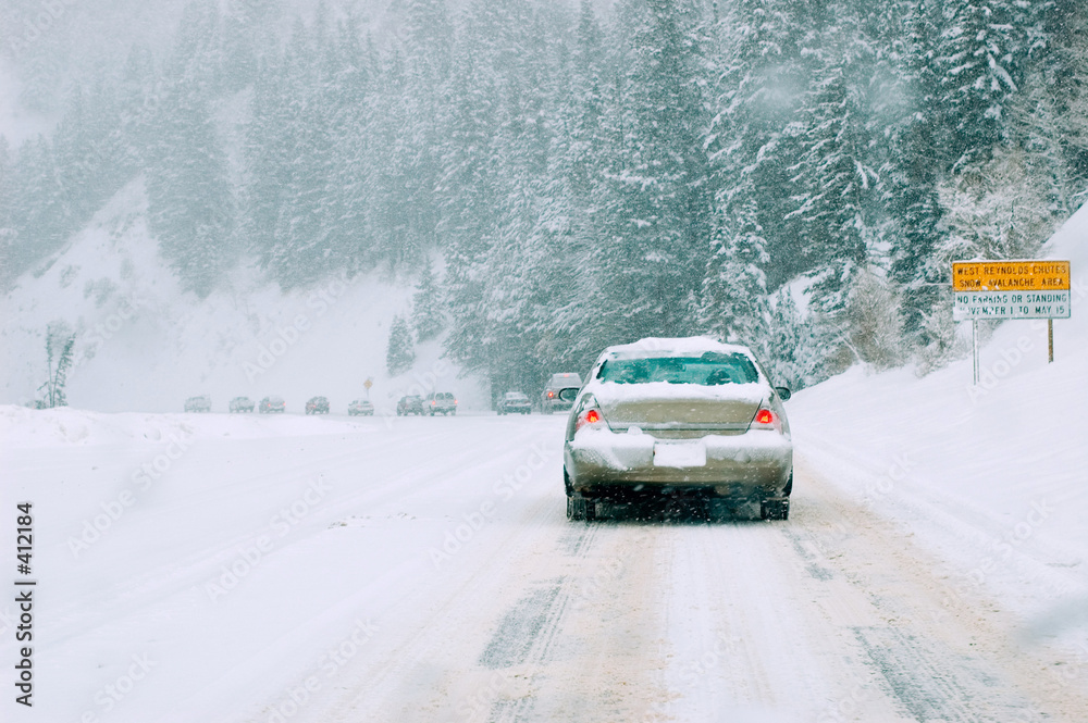 mountain road in snow storm mountain road in snow storm