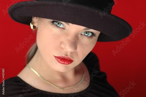woman in black hat