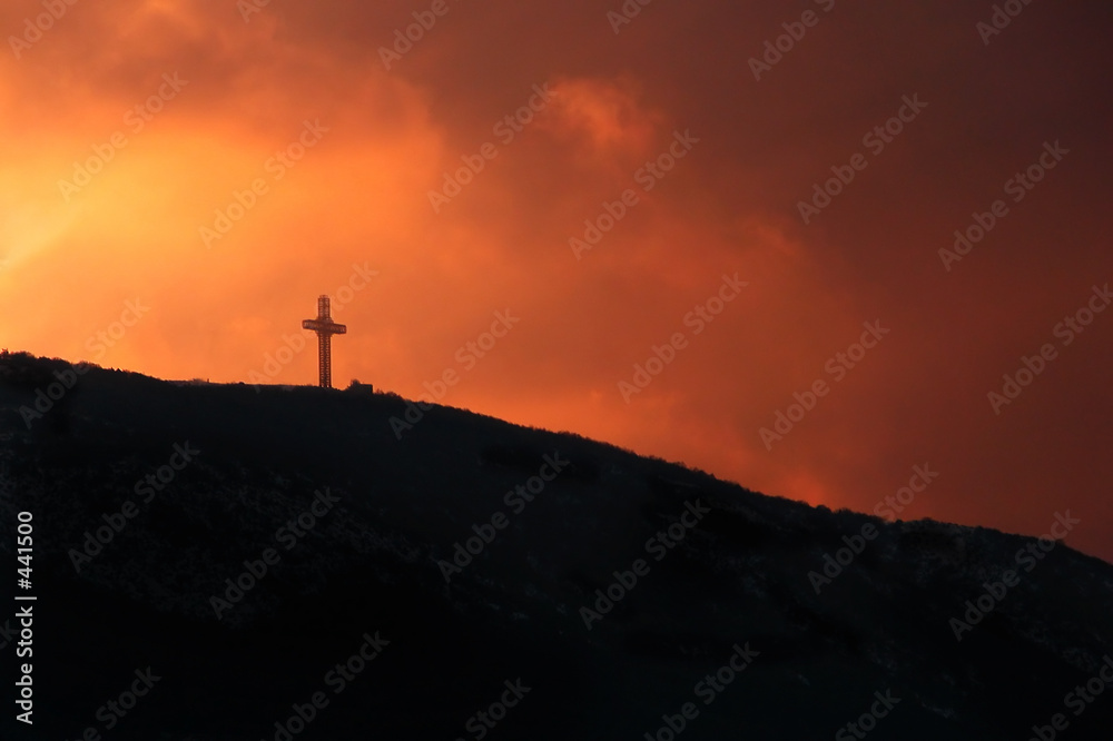 millennium cross washed in sunset