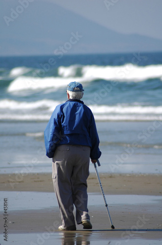 an old person on the beach