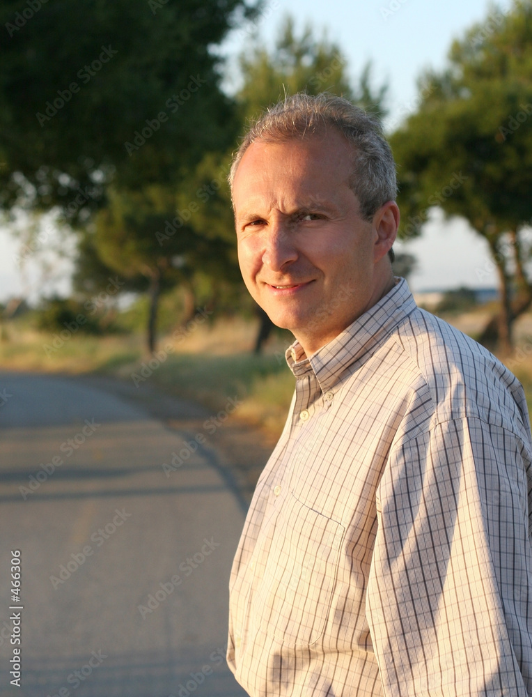 Fotografie mature man smiling outdoors