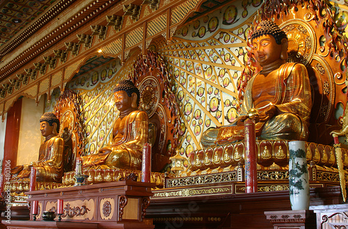 three buddha in buddhist temple