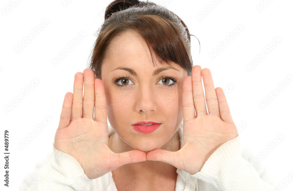 beautiful young brunette with hands near face beautiful young brunette with hands near face