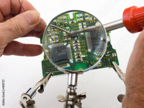 soldering pc board.jpg photo