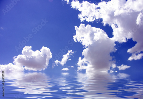 blue sky reflected in water