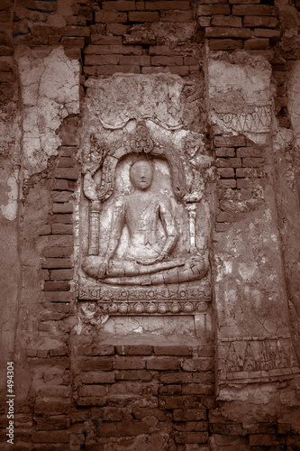 buddha carvings on wall