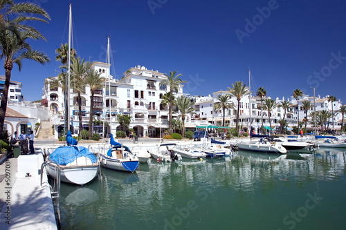 boats and yachts moored in duquesa port in spain on the costa de