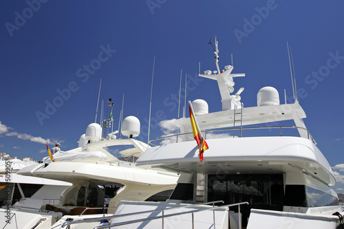 luxury white yachts moored close to each other in spain © Nick Stubbs