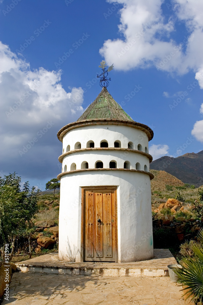 bird tower or dovecot on sunny spanish mountain