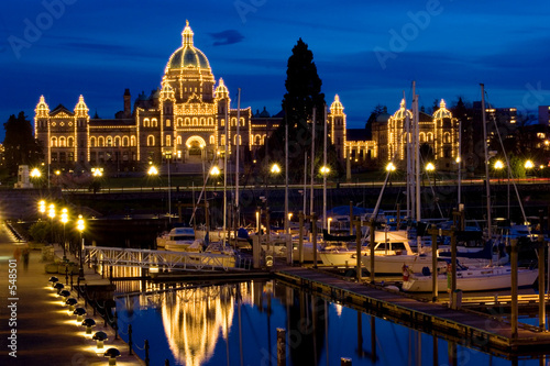 Parliament building illuminated at night, Victoria, British Columbia photo