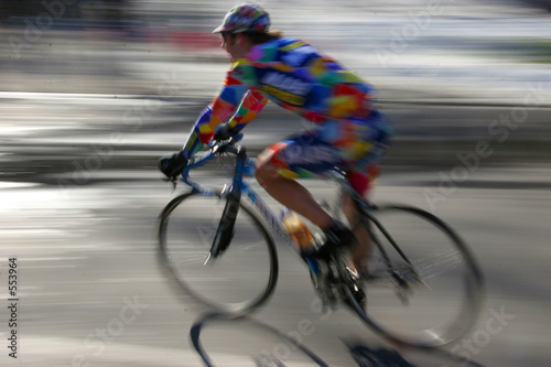 man racing on bicycle
