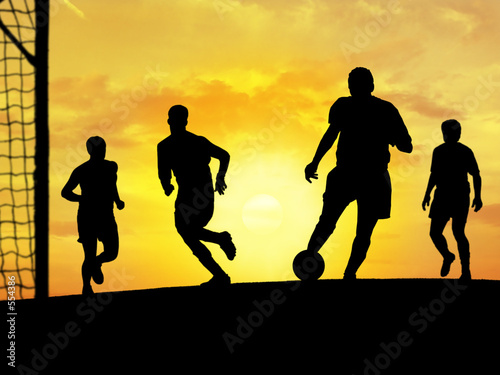 soccer players playing (sunset) #554386