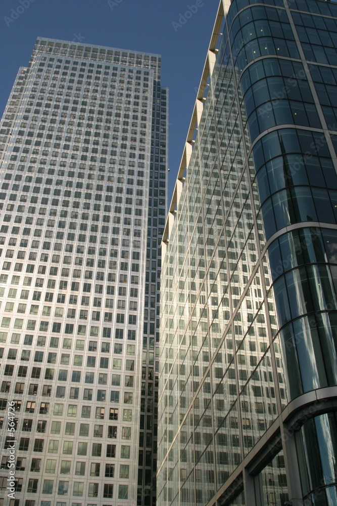 reflection of the sun on an office tower