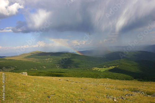 mountain landscape with rainbow