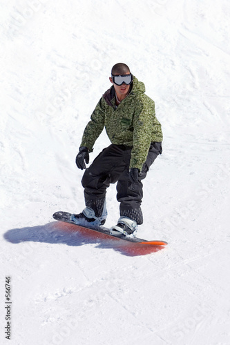 snowboarder on half pipe of ski resort in spain