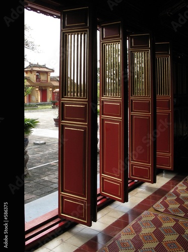 doors in forbidden purple city, hue, vietnam photo