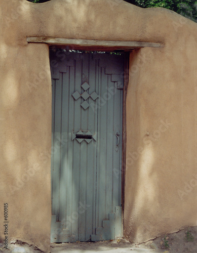 pale blue door in adobe
