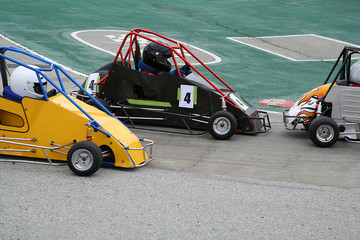 Fototapete Motorsport go-kart race (focus on center go-kart)  © Stephen Coburn