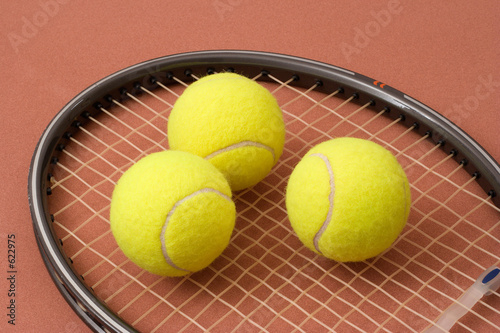 tennis balls and racket © ErickN