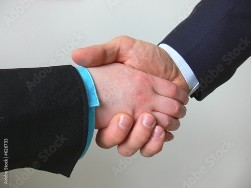 business handshake, woman and man