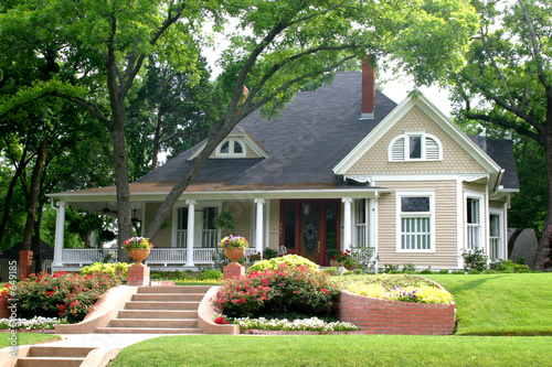 classic house with flower garden