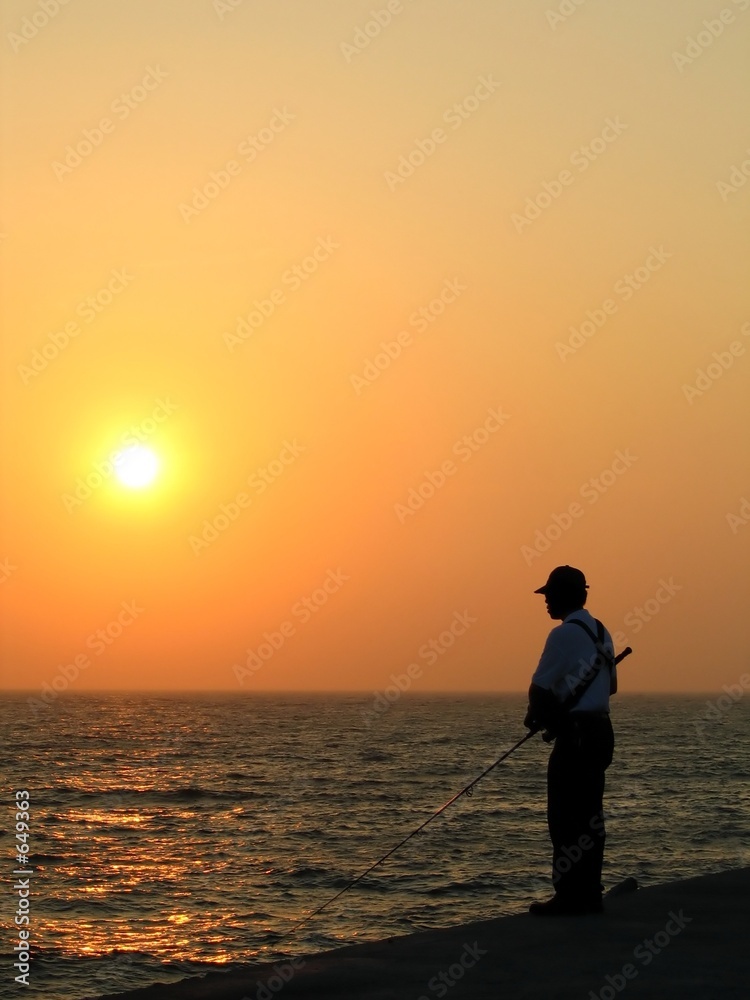 fisherman and sunset
