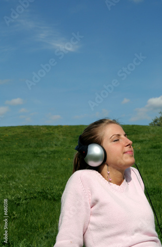young woman enjoying music
