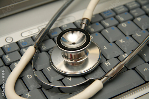 stethoscope on a laptop keyboard
