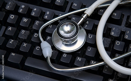stethoscope on a computer keyboard