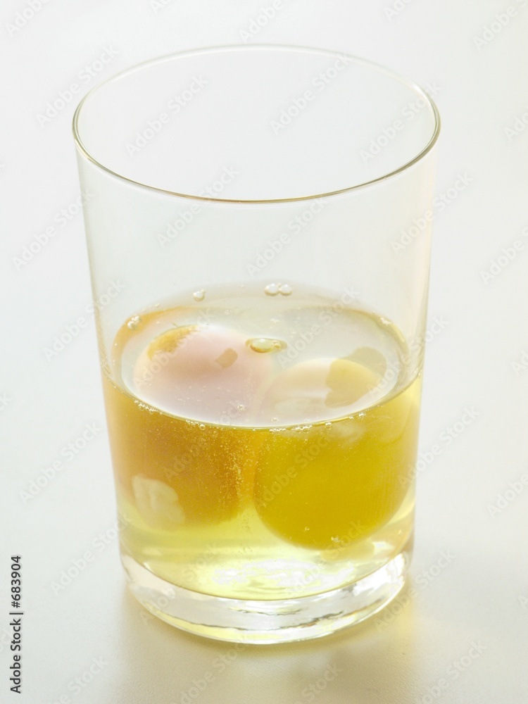 two eggs in glass two eggs in glass