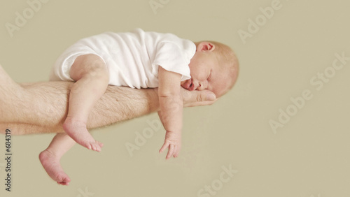 newborn baby girl with father