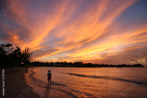 fiery sunset over the water in jamaica