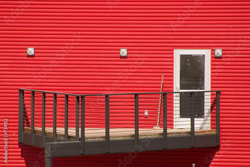 white door with red walls