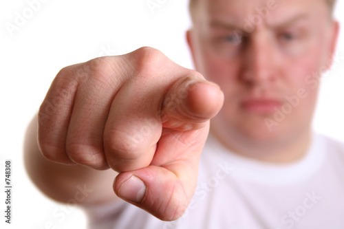 angry boy with finger to you photo