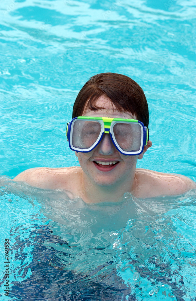 boy with swimming goggles