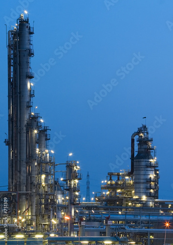 Oil refinery plant by night, oil refining and fossil fuel production in energy industry
