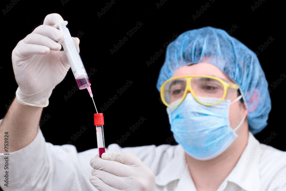 medical worker examining blood samples medical worker examining blood samples