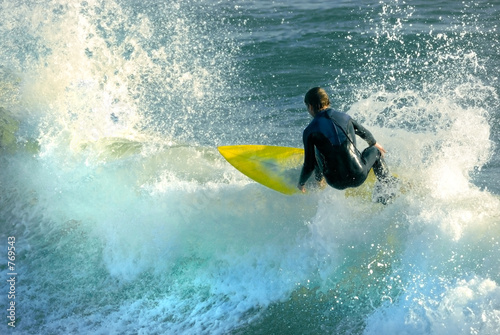 yellow surfboard, blue waters