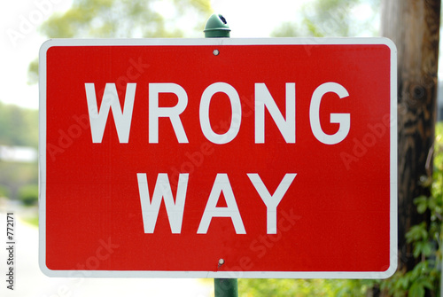 wrong way sign photo