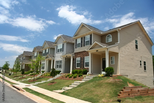 a row of new townhomes or condominiums