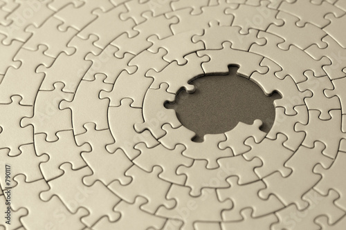 Photos jigsaw in sepia with missing pieces in the center