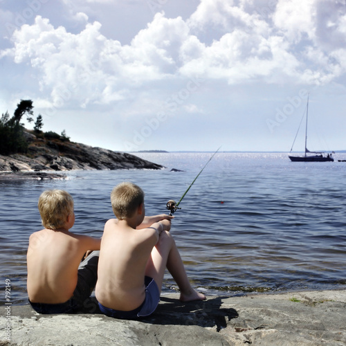two boys fishing