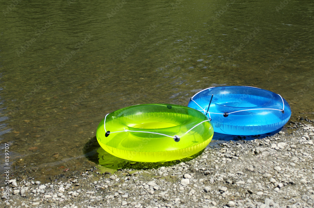 Obraz premium inflatable rings by river