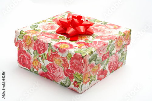 gift box with red ribbon, on white background © Rafa Irusta