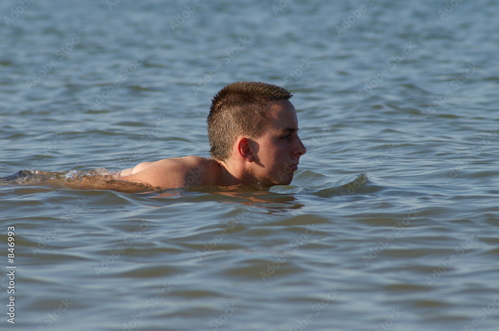 teenage boy swimming