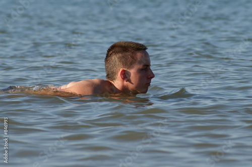 teenage boy swimming