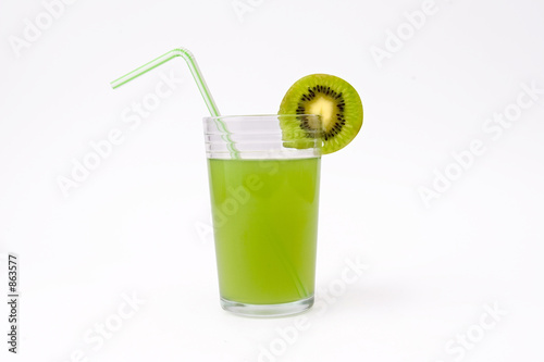 slice of kiwi and glass of kiwi juice with straw photo