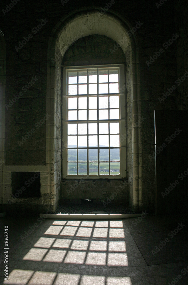sunshine through arched windows in stirling castle sunshine through arched windows in stirling castle