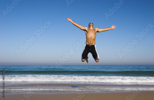 jumping on the beach